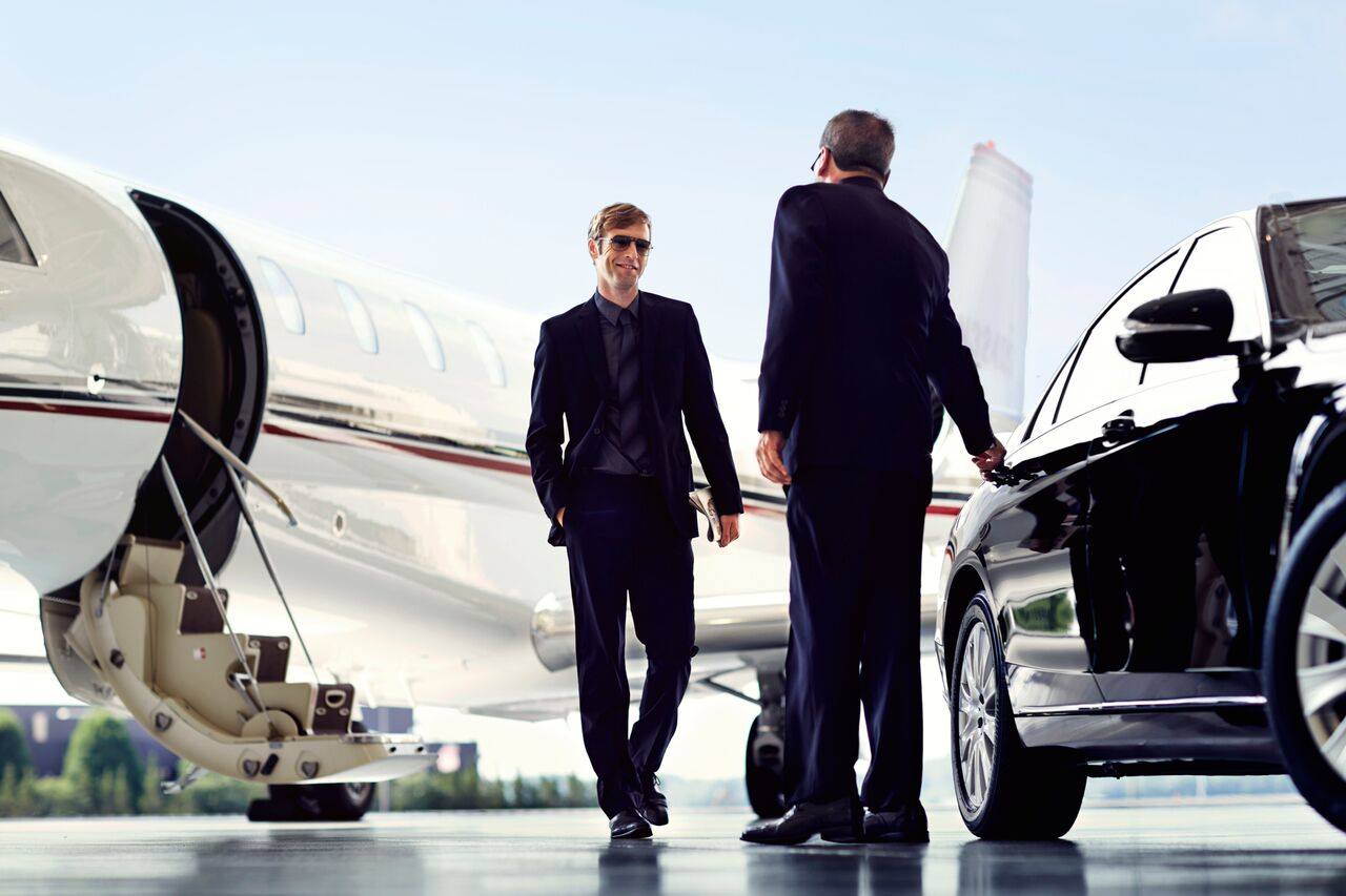 Private Jet passenger arriving with limo ground transportation service steamboat springs